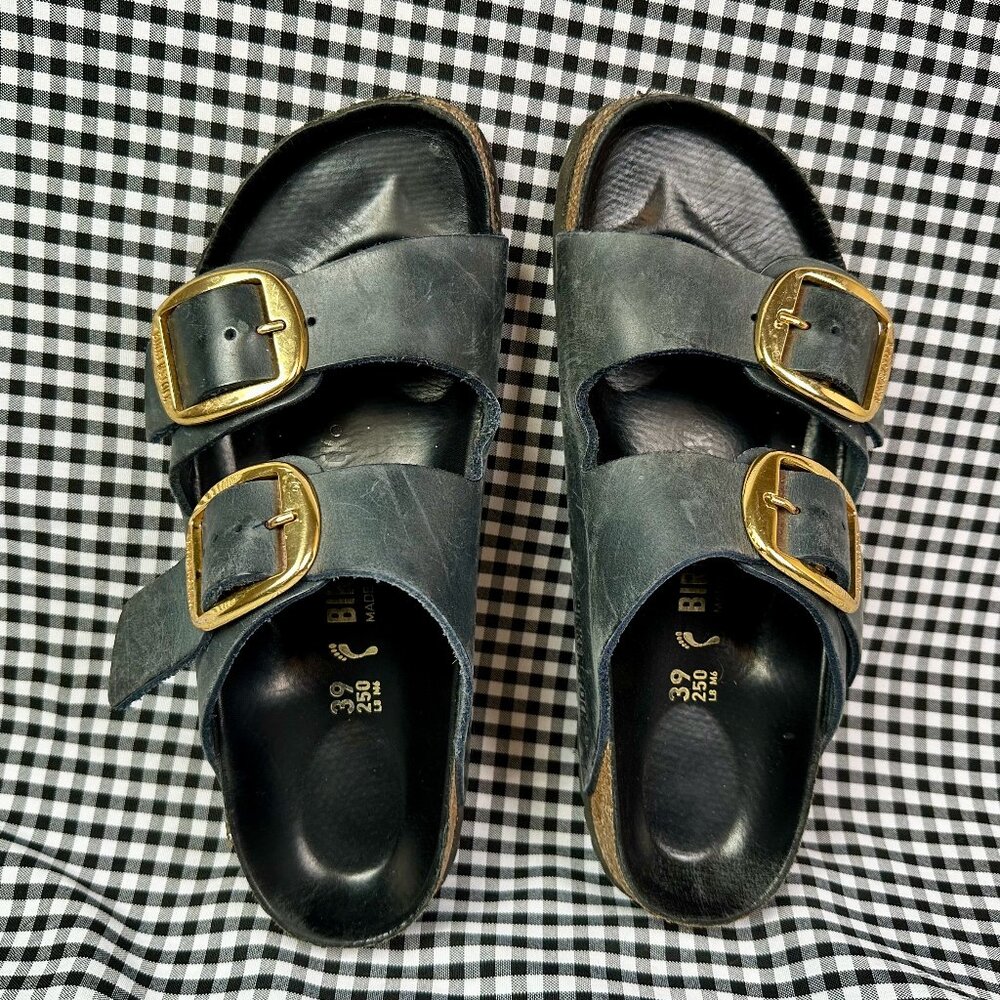 Birkenstock dark navy with large gold buckles